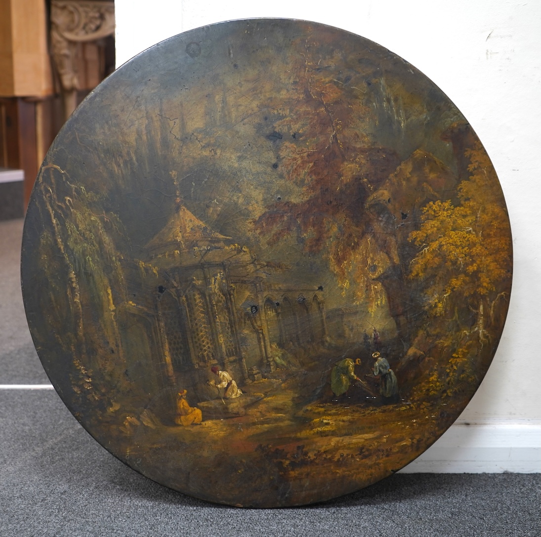 A Victorian japanned table top, depicting Indian grave robbers